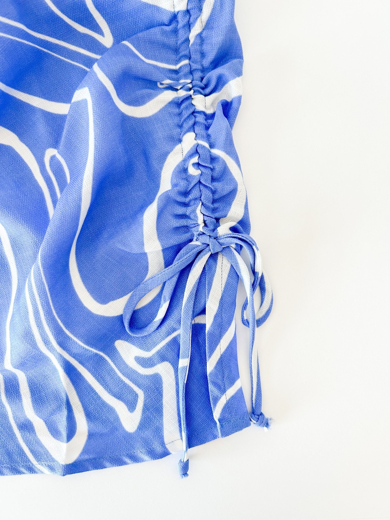 Blue Abstract Strapless Mini Dress - Styled by Ashley Brooke